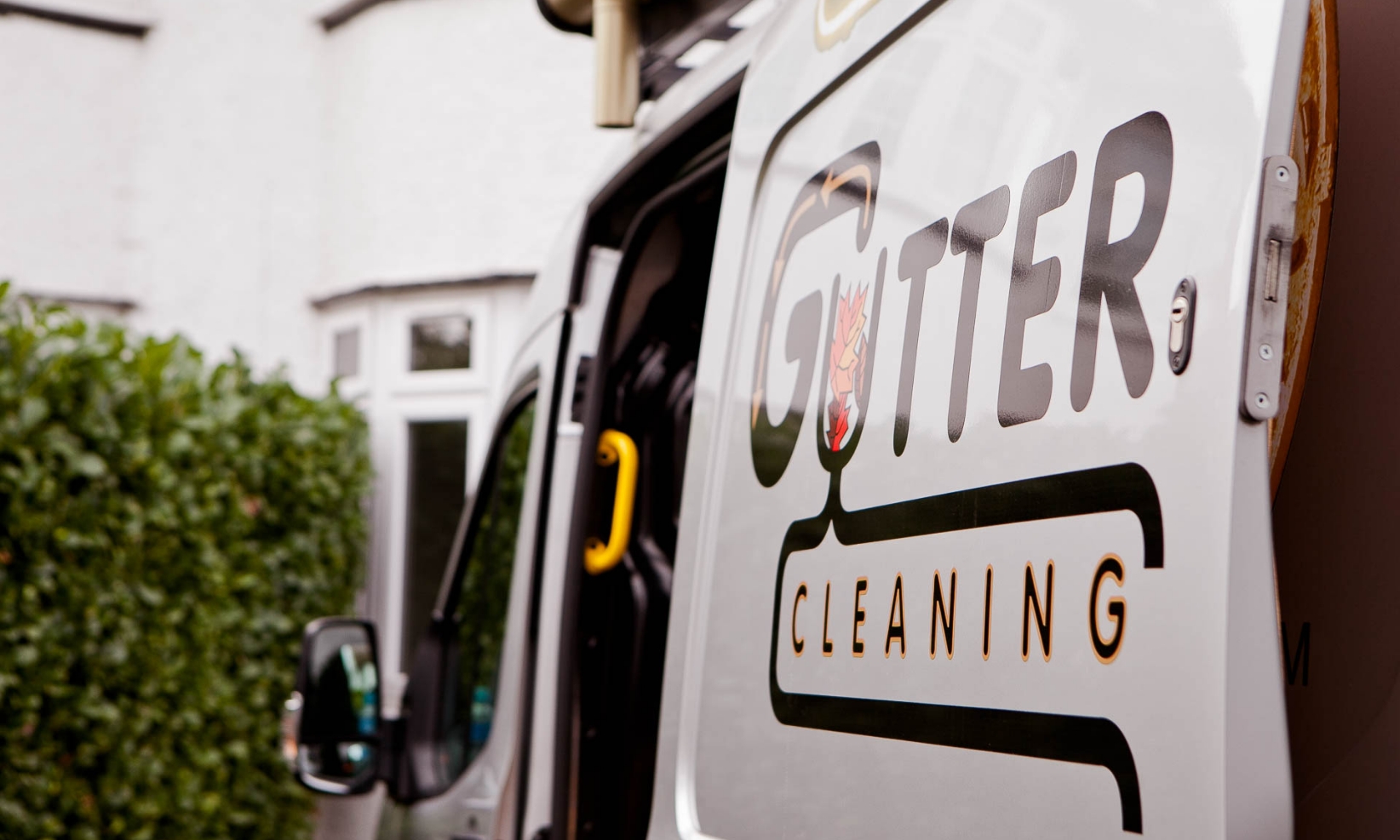 Quality Drainage side of van with signage